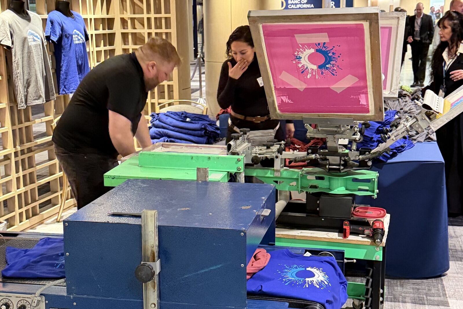 Full-color DTF transfer sheets being produced and prepared for heat press application